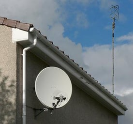 Satellite-dish-antennaon-wall